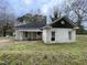 Exterior view of a charming one-story home featuring a covered porch and a classic design at 200 Rand Mill Rd, Garner, NC 27529