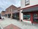 Street view of commercial businesses with storefronts, showcasing shopping and dining options at 200 Rand Mill Rd, Garner, NC 27529