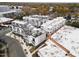 Aerial view of condo community and neighborhood with rooftops and tree coverage at 2000 Moody Ln, Durham, NC 27701
