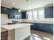 Kitchen featuring stainless appliances, kitchen island, recessed lighting and ample cabinet space at 2015 Trident Maple Ln, Chapel Hill, NC 27517