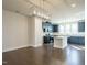 Open concept kitchen with stainless appliances, center island and modern cabinetry at 2015 Trident Maple Ln, Chapel Hill, NC 27517