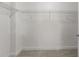 Spacious walk-in closet with metal shelving and carpeted floor for optimal storage at 222 Glenwood Ave # 608, Raleigh, NC 27603