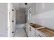 Bathroom with a tub and modern finishes, including sleek cabinets and tile work at 2305 Turners Aly, Raleigh, NC 27607