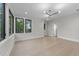 Bright bedroom with large windows, new hard wood floors, and recessed lighting at 2305 Turners Aly, Raleigh, NC 27607