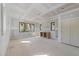 Bright, unfinished bedroom with multiple windows offering natural light and unfinished built-in shelving at 2305 Turners Aly, Raleigh, NC 27607