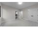 Spacious bedroom featuring neutral walls, two large windows, and access to an ensuite bathroom at 2305 Turners Aly, Raleigh, NC 27607