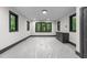 Finished bonus room with modern windows and trim, neutral walls, and recessed lighting at 2305 Turners Aly, Raleigh, NC 27607