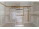 Walk-in closet with a built-in storage system and shelving at 2305 Turners Aly, Raleigh, NC 27607