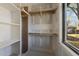 Walk-in closet with shelving and natural light at 2305 Turners Aly, Raleigh, NC 27607