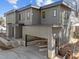 Contemporary home with vertical siding and a drive-under garage at 2305 Turners Aly, Raleigh, NC 27607