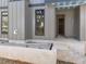Home's entrance with stone gravel, featuring modern design elements at 2305 Turners Aly, Raleigh, NC 27607
