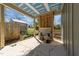 Covered patio with an unfinished fireplace, awaiting your personal touch at 2305 Turners Aly, Raleigh, NC 27607
