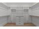 Spacious walk-in closet with ample storage and custom shelving at 2305 Turners Aly, Raleigh, NC 27607
