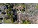 Captivating aerial view showcasing the home's setting amidst lush greenery and surrounding trees at 2421 Acanthus Dr, Wake Forest, NC 27587