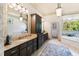 Large bathroom with double vanity and a soaking tub at 2421 Acanthus Dr, Wake Forest, NC 27587