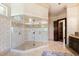 Modern bathroom with walk-in glass shower and detailed tile work at 2421 Acanthus Dr, Wake Forest, NC 27587