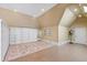 Bonus room with built-in shelving, ample space, and natural light ideal for recreation at 2421 Acanthus Dr, Wake Forest, NC 27587
