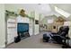 Cozy bonus room with built-in shelves and a comfortable entertainment area featuring a recliner at 2421 Acanthus Dr, Wake Forest, NC 27587