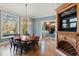 Elegant dining room with fireplace and backyard view at 2421 Acanthus Dr, Wake Forest, NC 27587