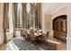 Formal dining room with natural light, elegant furniture, and space to entertain at 2421 Acanthus Dr, Wake Forest, NC 27587
