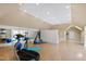 Bright home gym with cork flooring, mirrored wall, and workout equipment for fitness enthusiasts at 2421 Acanthus Dr, Wake Forest, NC 27587