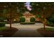 Stately brick home featuring a circular driveway and fountain at 2421 Acanthus Dr, Wake Forest, NC 27587