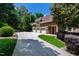 Luxurious home featuring a three-car garage and meticulously landscaped grounds at 2421 Acanthus Dr, Wake Forest, NC 27587