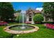 Up close image of the fountain with the home in the background at 2421 Acanthus Dr, Wake Forest, NC 27587