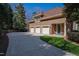 Attached three-car garage with concrete driveway and well-maintained landscaping at 2421 Acanthus Dr, Wake Forest, NC 27587