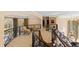 Second floor hallway featuring decorative iron railings and views to the exterior at 2421 Acanthus Dr, Wake Forest, NC 27587