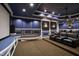 Cozy home theater with comfortable seating and a large screen for a cinematic experience at 2421 Acanthus Dr, Wake Forest, NC 27587