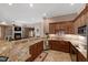 Elegant kitchen with granite countertops and stainless steel appliances at 2421 Acanthus Dr, Wake Forest, NC 27587
