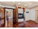Spacious living room features wood floors and a stone fireplace at 2421 Acanthus Dr, Wake Forest, NC 27587
