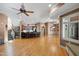 Open living room boasts a wet bar, hardwood floors, and natural light at 2421 Acanthus Dr, Wake Forest, NC 27587