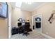 Home office with two work stations, a ceiling fan, and natural lighting at 2421 Acanthus Dr, Wake Forest, NC 27587