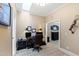 Comfortable office featuring a dark desk and chair, and decorations on the walls at 2421 Acanthus Dr, Wake Forest, NC 27587