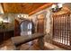 Charming wine cellar with stone walls, custom wine storage, and wooden ceiling at 2421 Acanthus Dr, Wake Forest, NC 27587