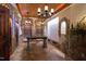 Unique wine cellar with stone walls, custom lighting, and ample storage at 2421 Acanthus Dr, Wake Forest, NC 27587