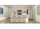Bright kitchen features stainless steel appliances, a stylish island with seating, and ample cabinet space at 244 St Andrews Dr, Zebulon, NC 27597