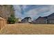 View of the fenced backyard of this home, with ample space at 257 Swann Trl, Clayton, NC 27527