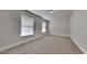 Bedroom with two windows showing white window blinds at 257 Swann Trl, Clayton, NC 27527