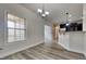 Bright dining area offers wood floors and easy access to the kitchen at 257 Swann Trl, Clayton, NC 27527