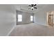 Bright main bedroom with dual windows and neutral paint at 257 Swann Trl, Clayton, NC 27527