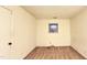 This carpeted bedroom features a window bringing natural light into the living space at 2726 Thelma St, Durham, NC 27704