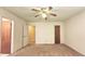 Spacious bedroom features a ceiling fan and multiple doors, perfect for any design at 2726 Thelma St, Durham, NC 27704