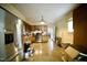 Well-lit kitchen with stainless steel appliances, wooden cabinets, and ample counter space at 2726 Thelma St, Durham, NC 27704