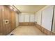 Bright sunroom with paneling, multiple windows, and tile floors, great for relaxation at 2726 Thelma St, Durham, NC 27704