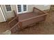 Spacious wooden back deck with railings, perfect for outdoor relaxation and entertaining at 300 Pate St, Apex, NC 27502