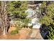 Beautiful home with a well-manicured lawn and lush landscaping, adding to its charm at 300 Pate St, Apex, NC 27502