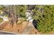 Charming home with green trim nestled among mature trees, offering great curb appeal at 300 Pate St, Apex, NC 27502